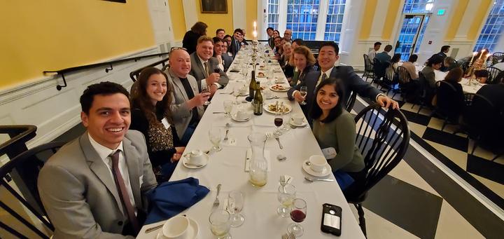 Photo of Lowellians at the final high table of the semester, candlelit