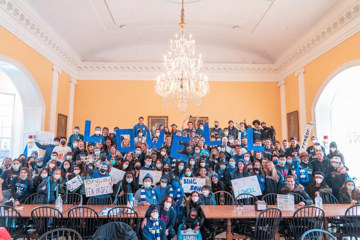 Photo of Lowellians in Housing Day gear in dining hall