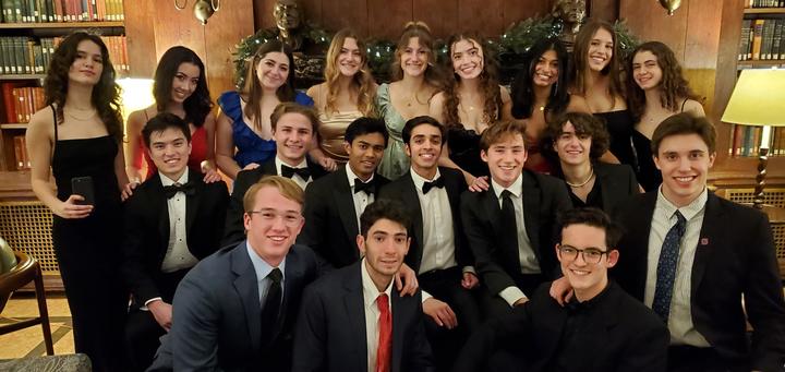 Yule Ball party-goers gather in the Lowell library