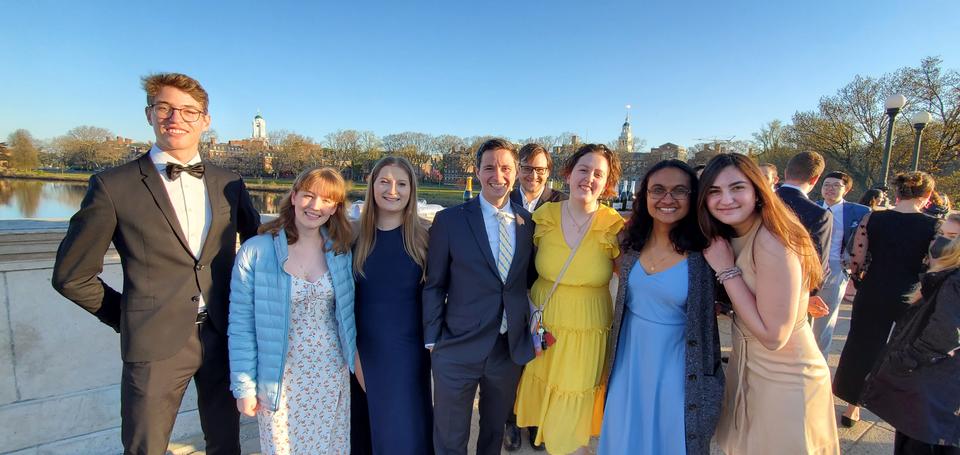 A group of Lowellians stands on the Weeks bridge for May Day waltzing
